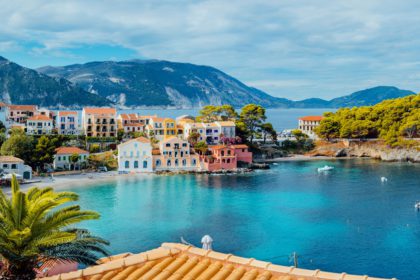 Scenic panoramic view of Assos village on summer morning, Kefalonia island. Summer luxury tourism